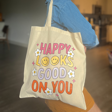 Load image into Gallery viewer, Happy looks good on you Tote Bag
